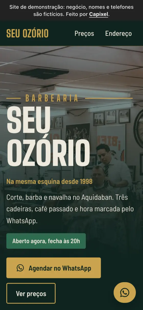 Sample barbershop website on a phone